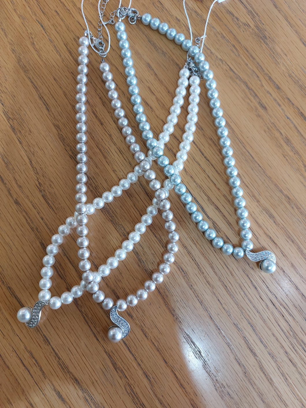 Nouvelle - Pearl chain with swirl drop